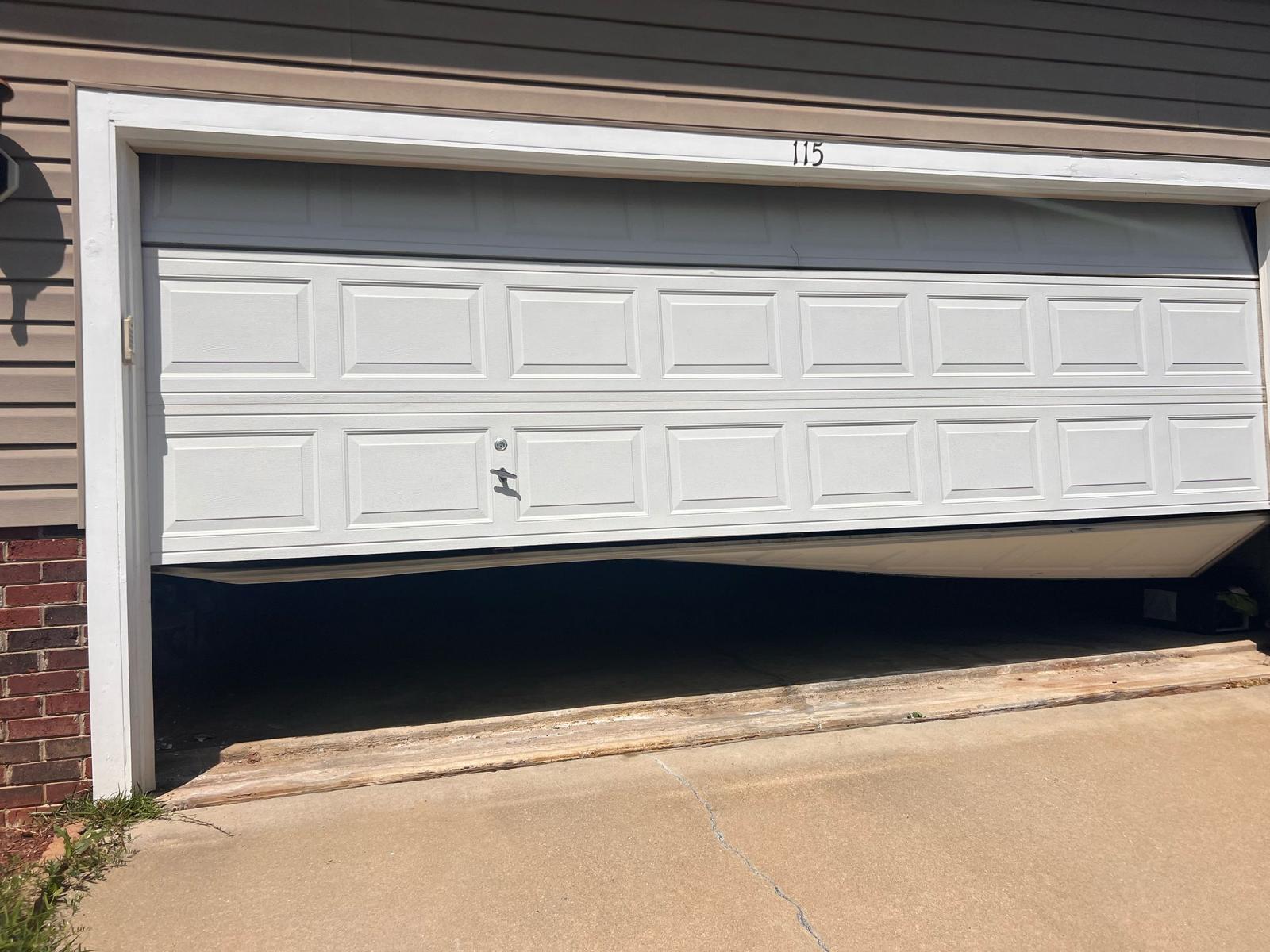 Off-track garage door repair