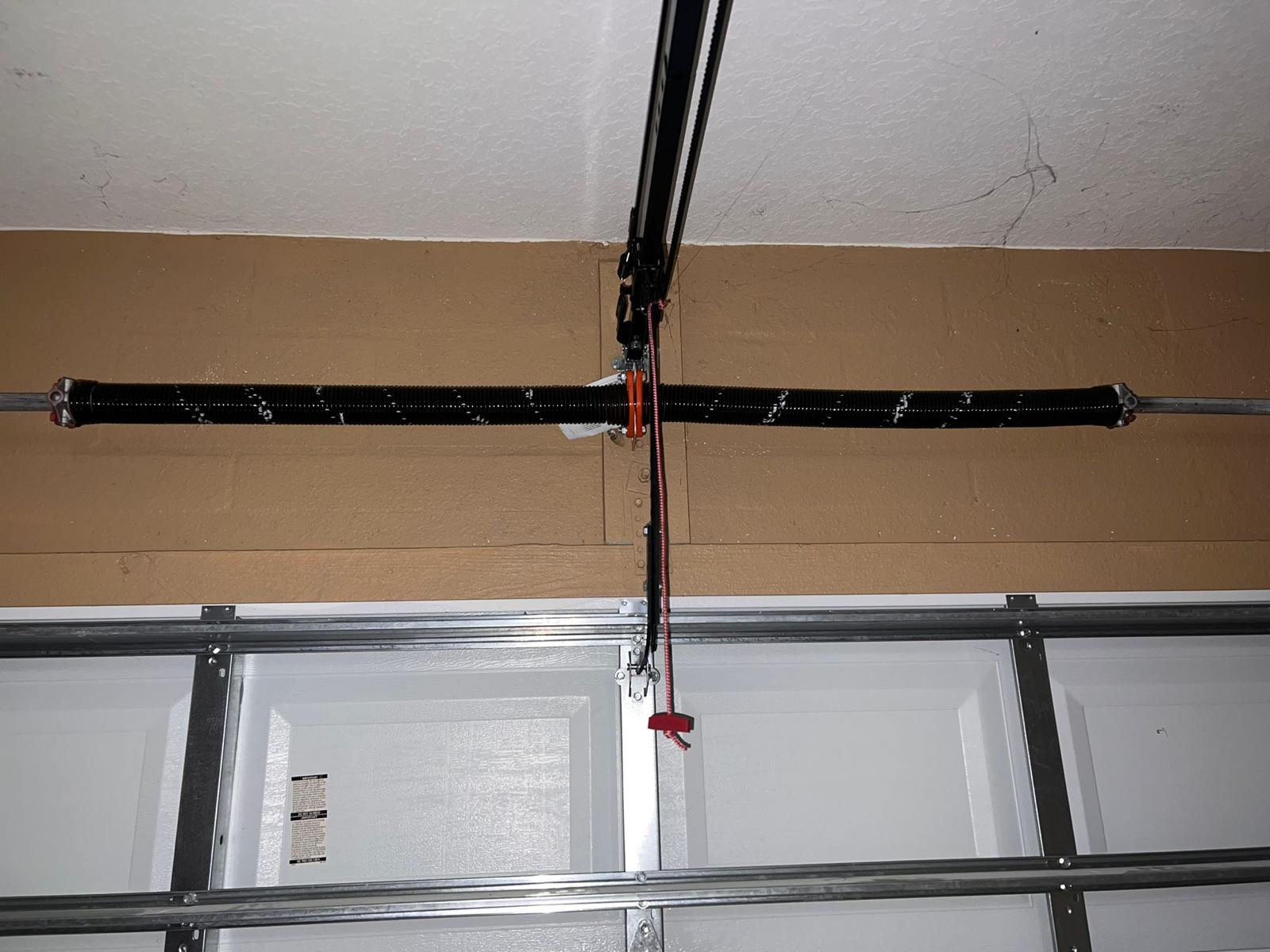 Torsion spring installation in Aventura home